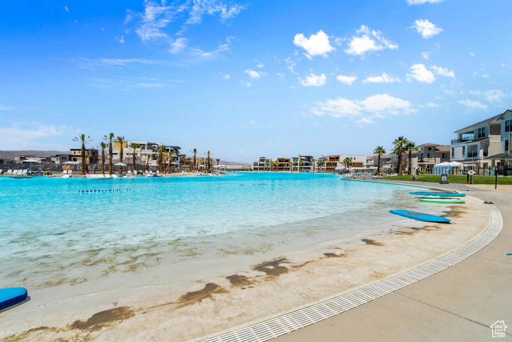 View of pool featuring a view of the beach