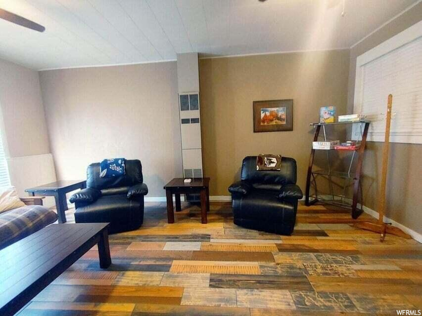 Sitting room featuring hardwood / wood-style flooring