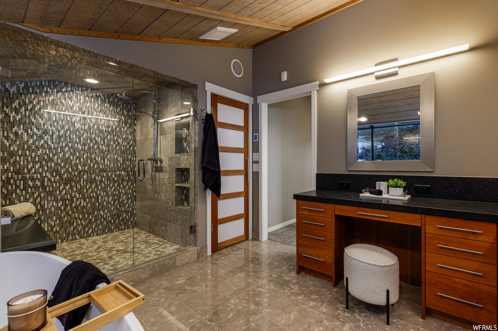 Bathroom featuring lofted ceiling, plus walk in shower, wooden ceiling, and vanity