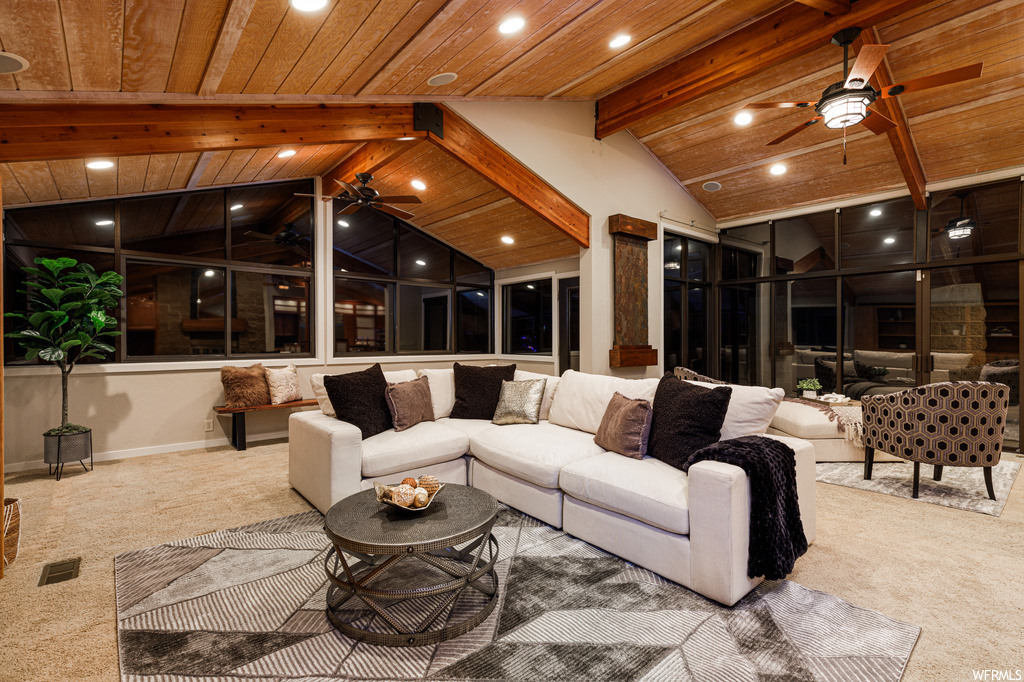 Interior space with an outdoor hangout area and ceiling fan