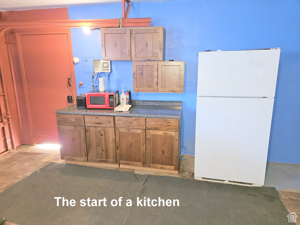 Kitchen with white fridge