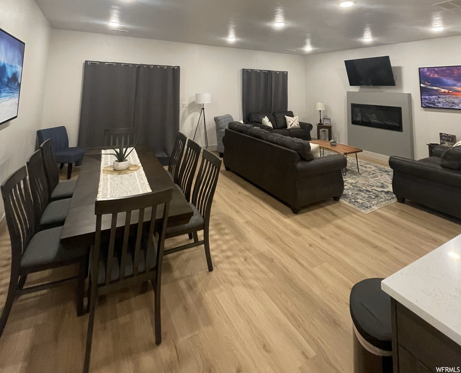 Dining space featuring light hardwood / wood-style floors