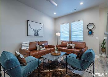 Living room with hardwood / wood-style floors