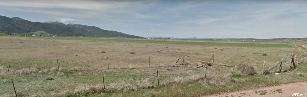 View of mountain feature with a rural view