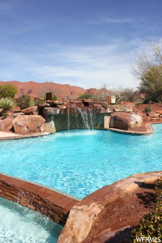 View of pool with pool water feature