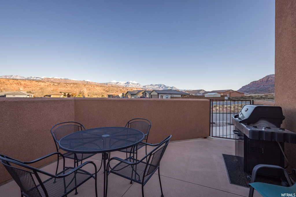 View of patio with a mountain view