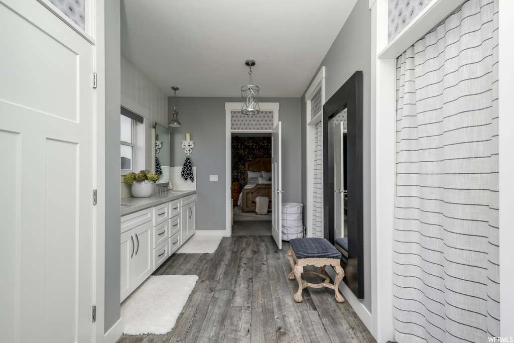 Interior space with dark hardwood / wood-style flooring