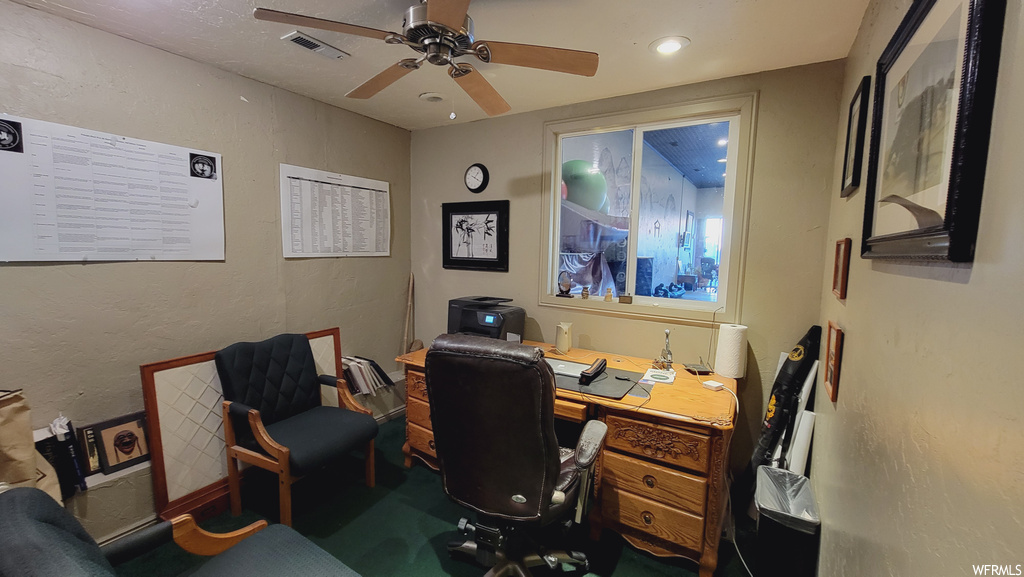 Home office with ceiling fan