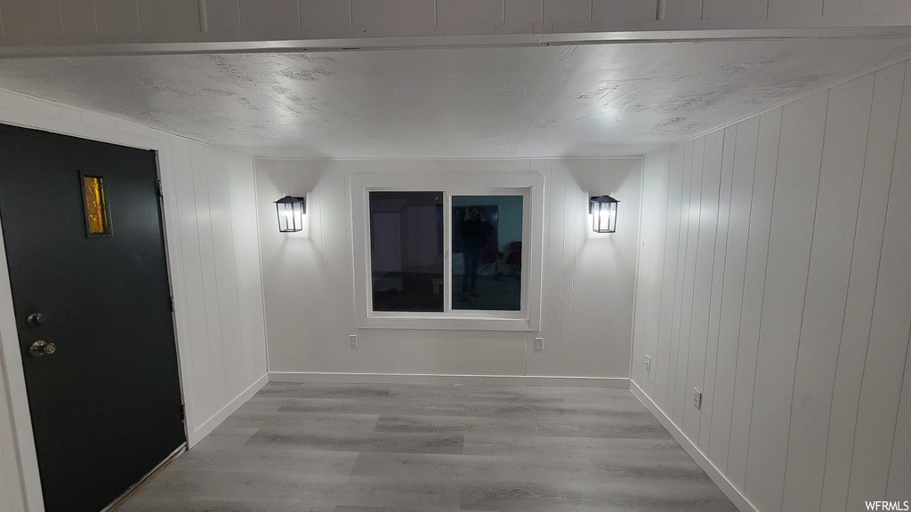 Empty room featuring light hardwood / wood-style floors