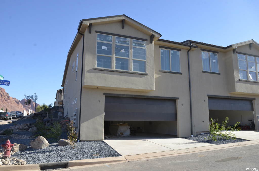 View of front of house with a garage