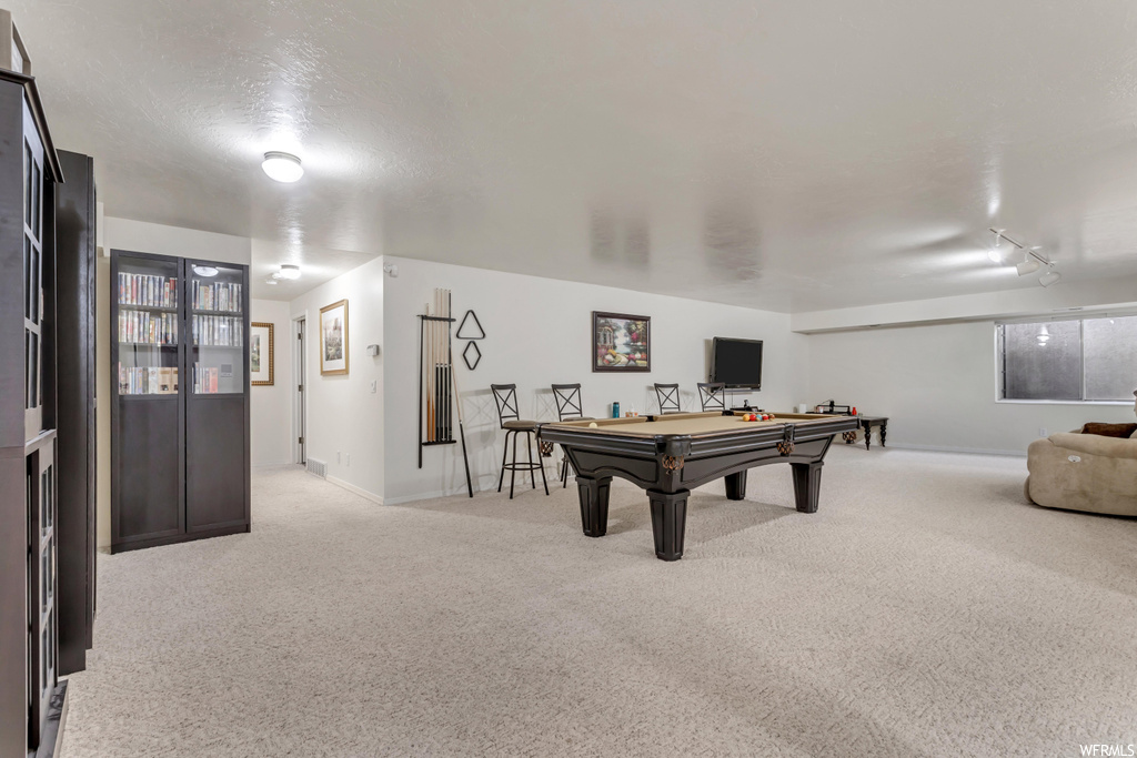 Rec room featuring billiards and light colored carpet