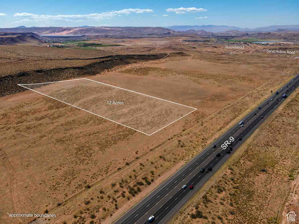 Drone / aerial view featuring a mountain view