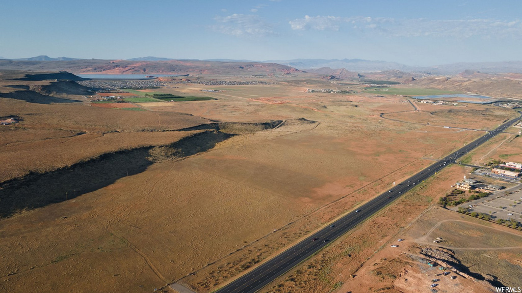 Birds eye view of property with a rural view