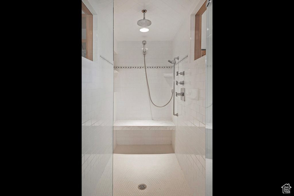 Bathroom featuring tiled shower