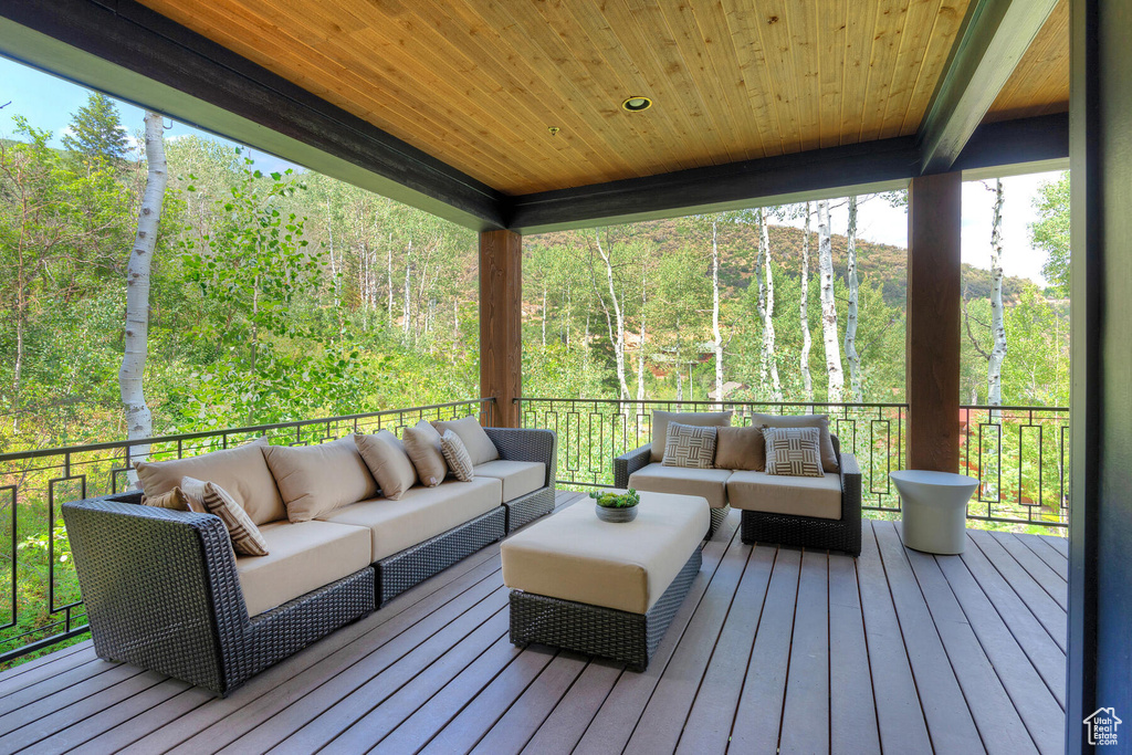 Wooden terrace with outdoor lounge area