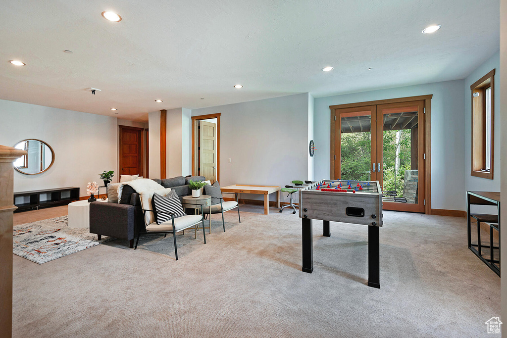 Playroom with carpet and french doors