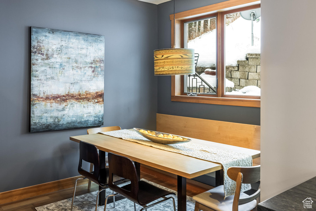 Dining area featuring hardwood / wood-style flooring