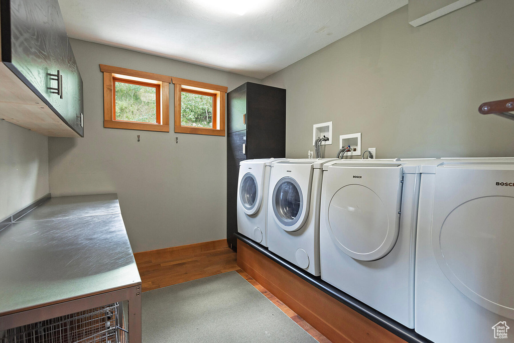 Laundry area featuring hookup for a washing machine and washer and clothes dryer