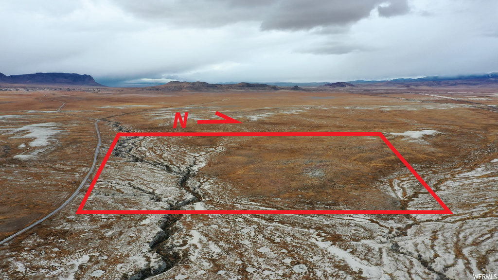 Drone / aerial view featuring a rural view and a mountain view