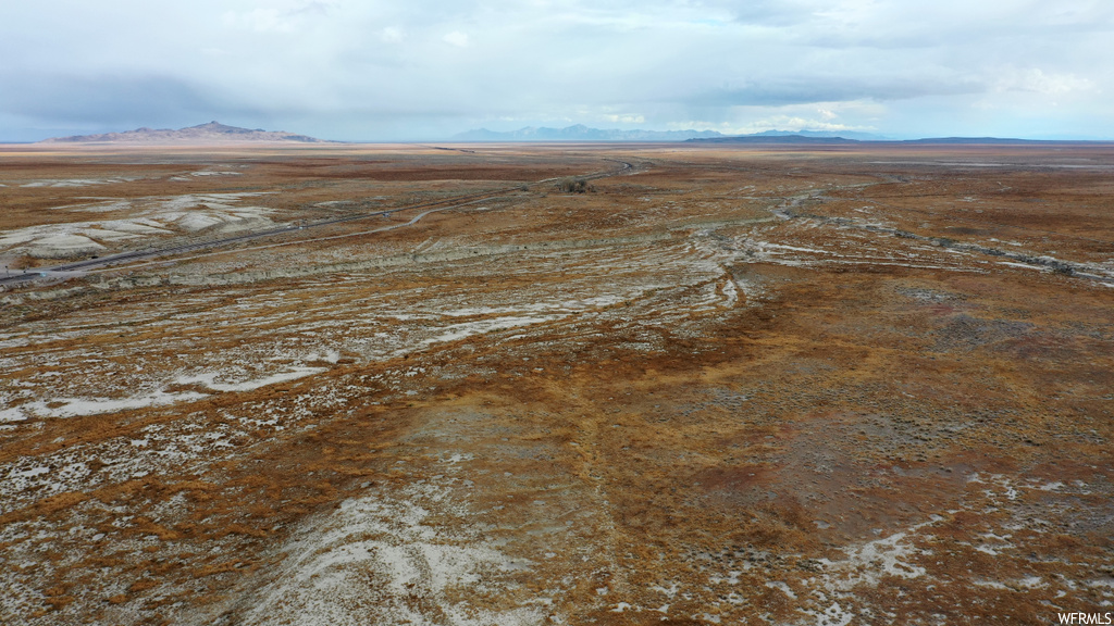 Birds eye view of property with a rural view