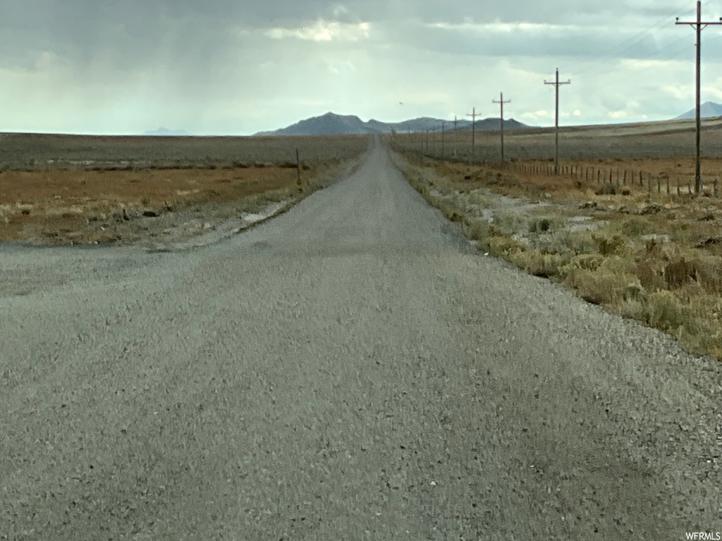 View of road with a mountain view and a rural view