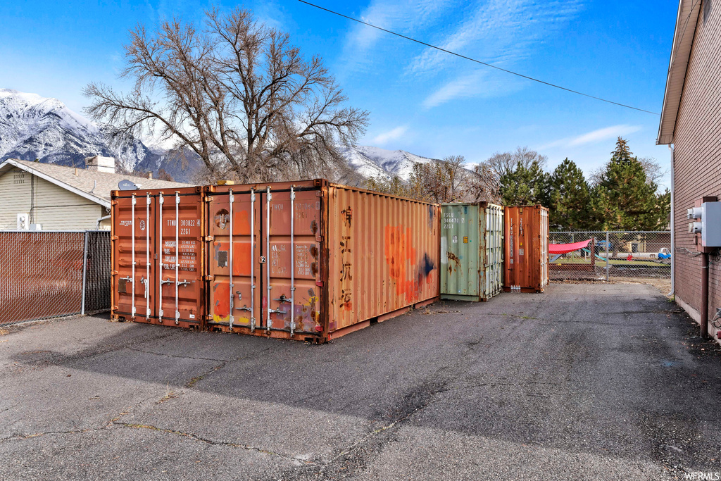 View of shed / structure with a mountain view