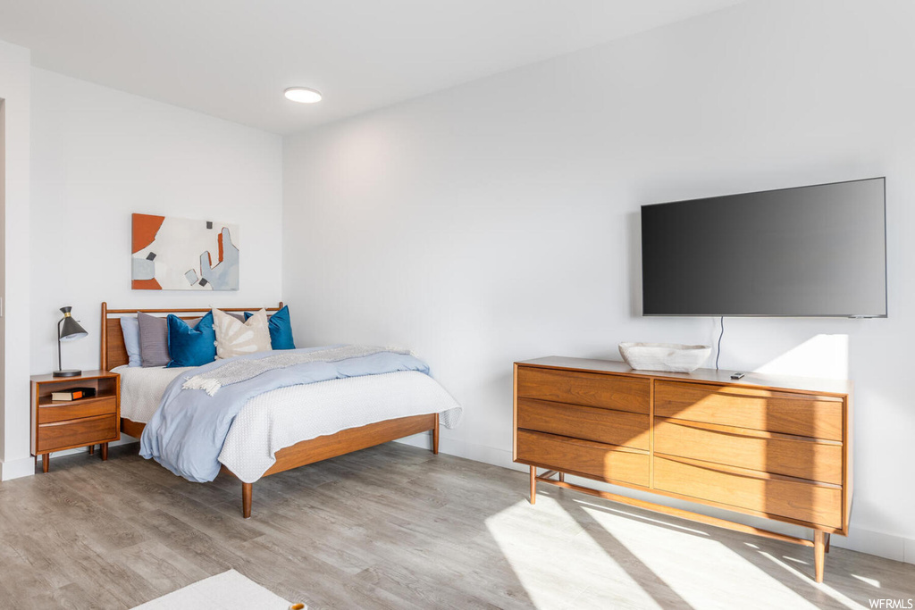Bedroom featuring light hardwood / wood-style flooring