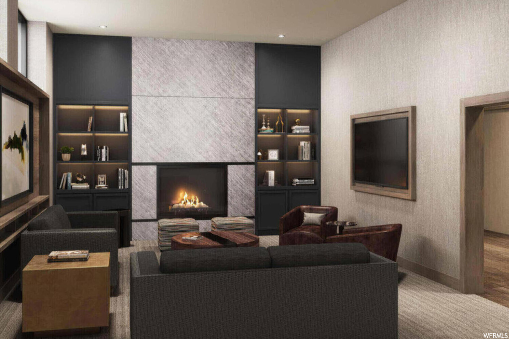 Living room featuring light wood-type flooring and a tile fireplace