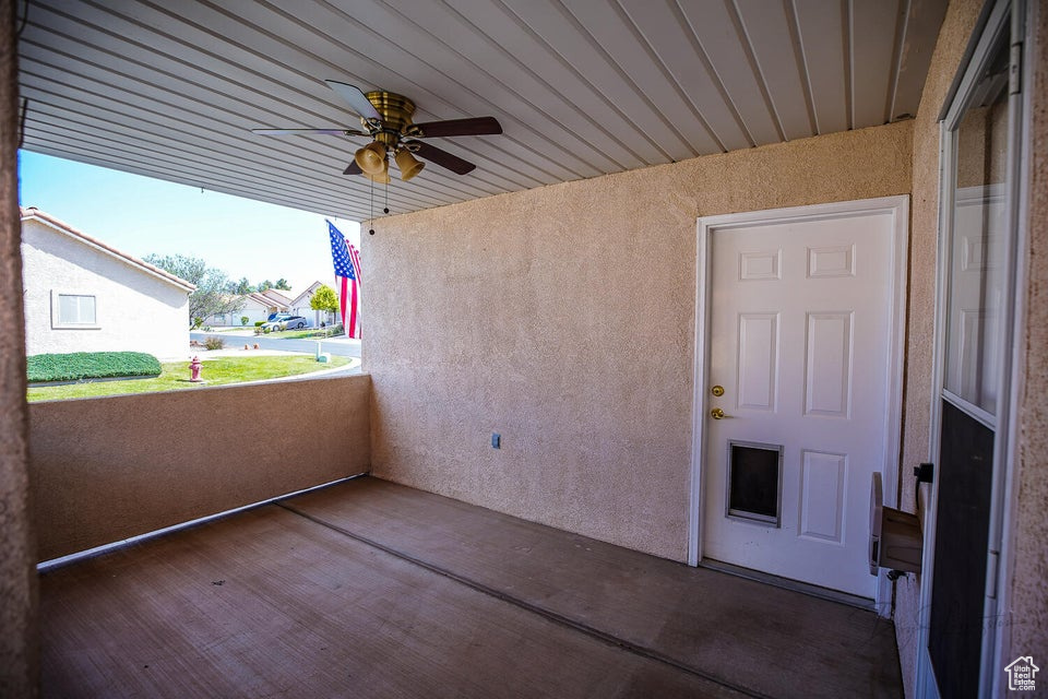 Exterior space with ceiling fan