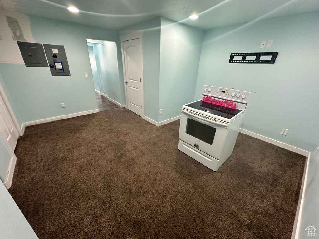 Rec room featuring dark colored carpet