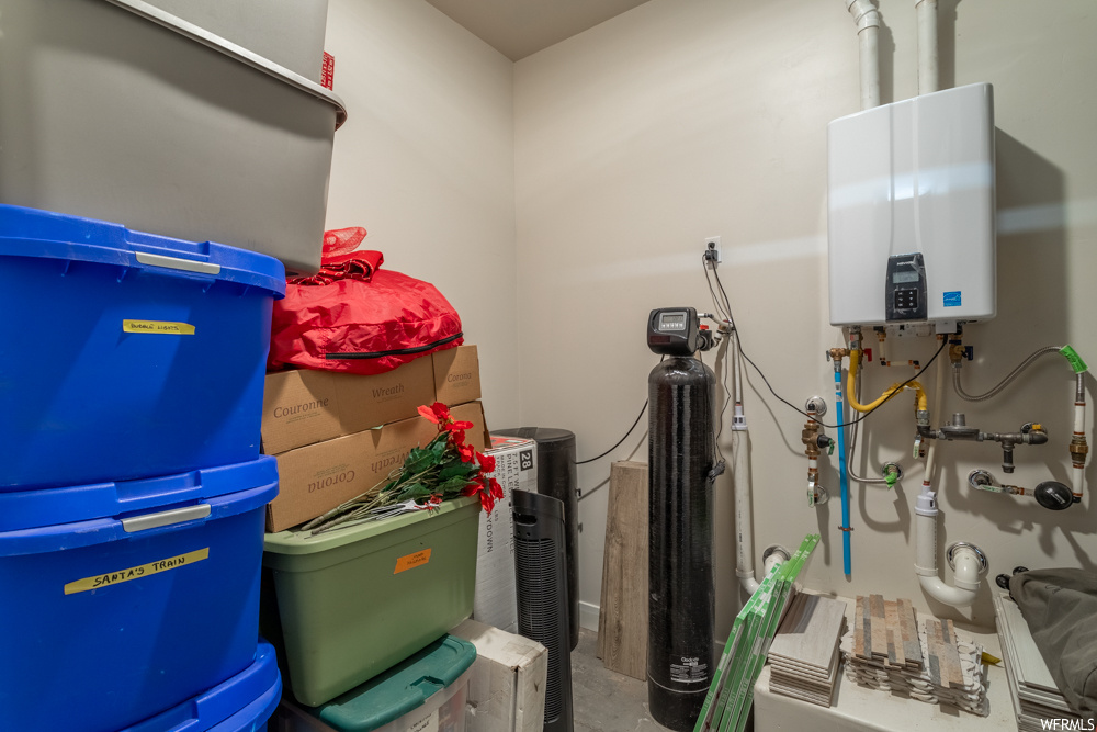 Storage area with tankless water heater