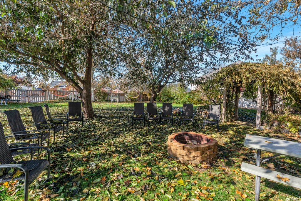 View of yard featuring a fire pit