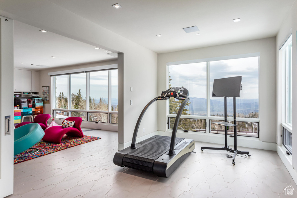 Exercise area featuring healthy amount of natural light and recessed lighting