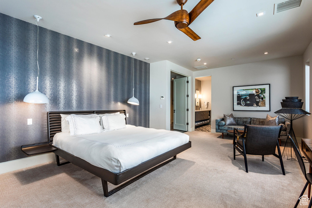 Bedroom featuring light colored carpet, ensuite bathroom, baseboards, a ceiling fan, and recessed lighting