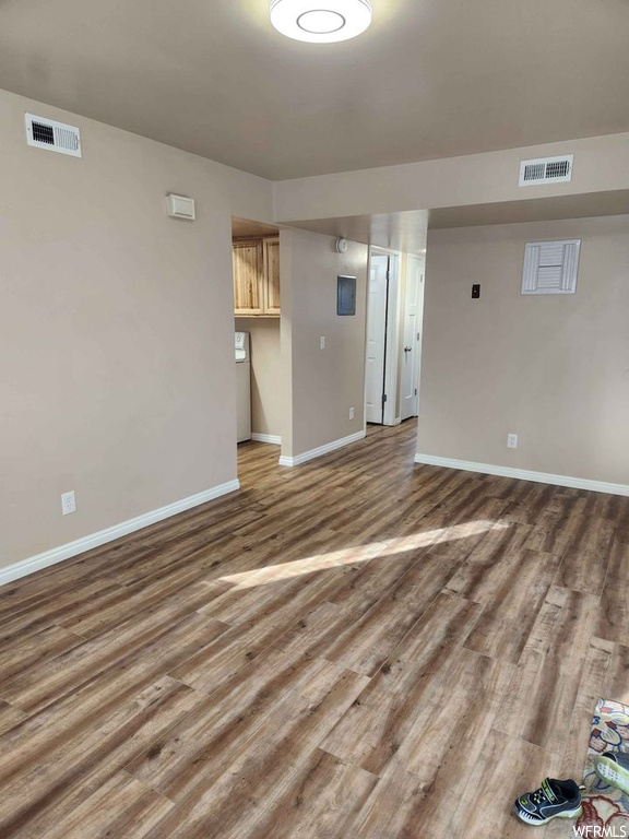 Empty room featuring hardwood / wood-style floors