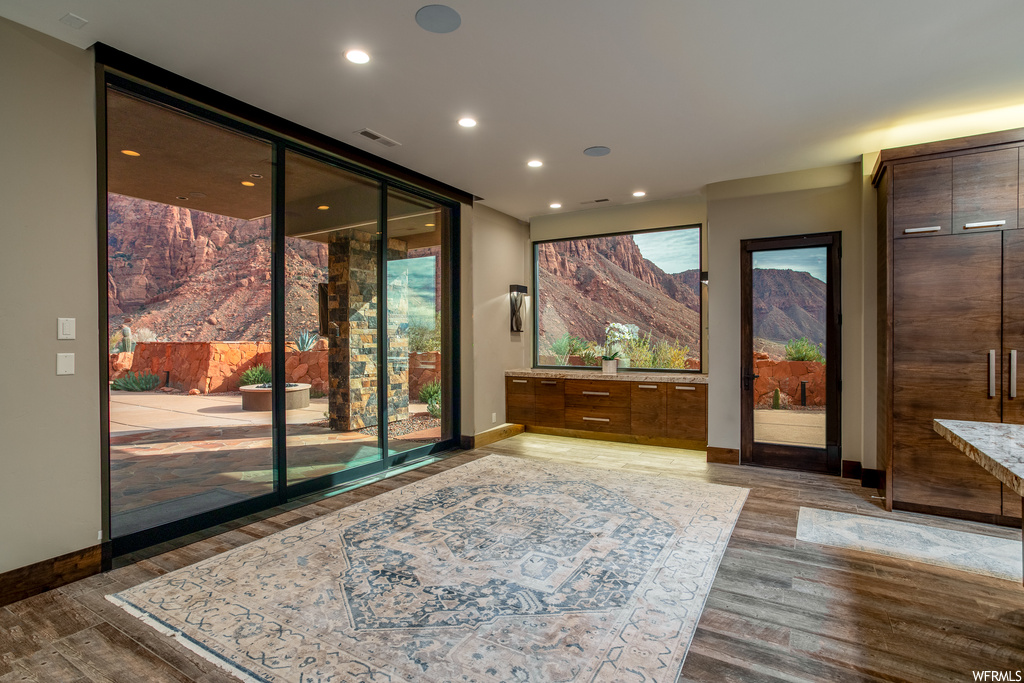 Living area featuring dark wood-type flooring