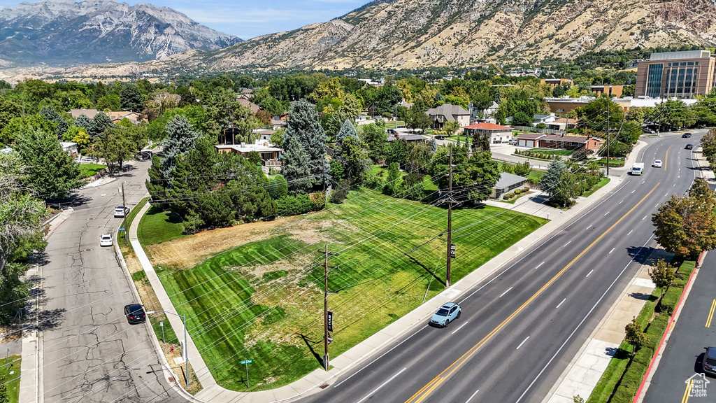 Birds eye view of property with a mountain view