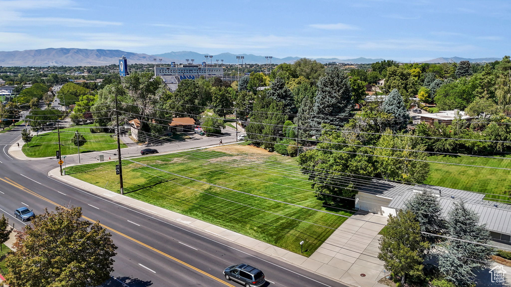 Birds eye view of property with a mountain view