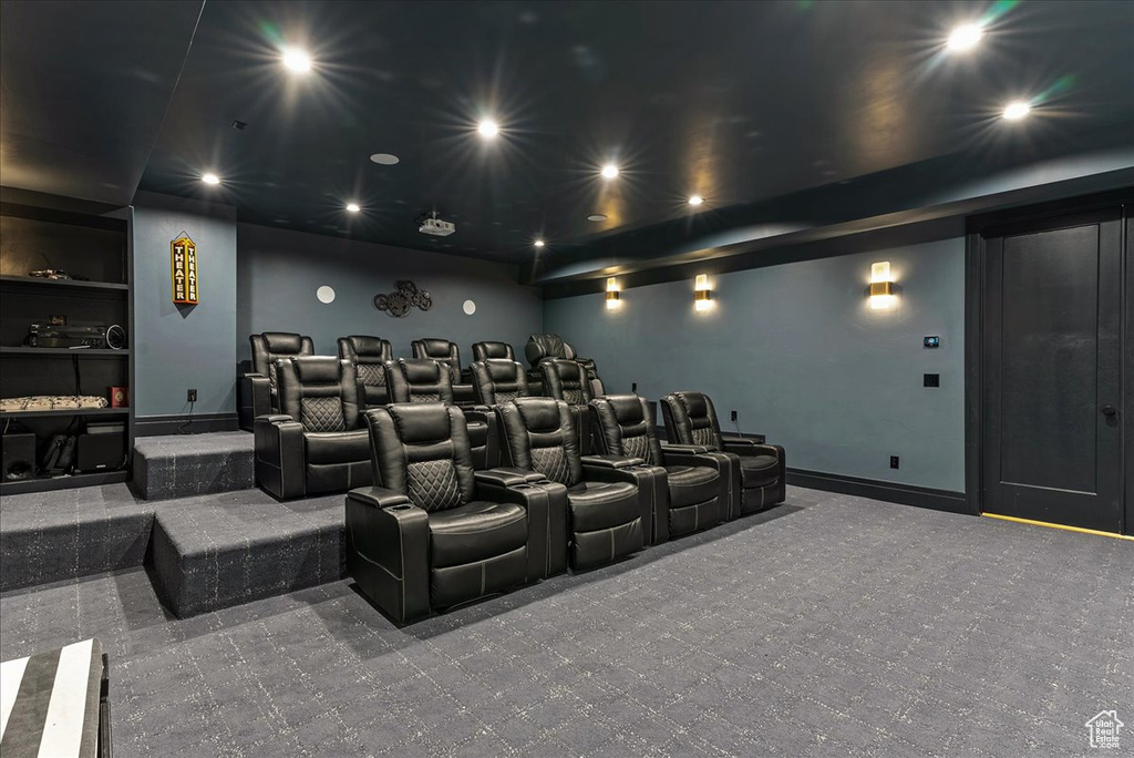 Cinema room featuring carpet flooring