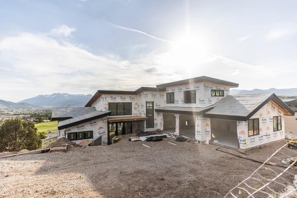 Unfinished property with a mountain view