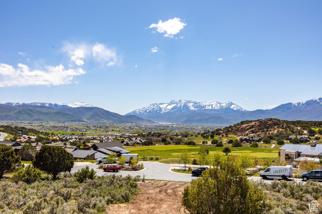 View of mountain background featuring nearby suburban area