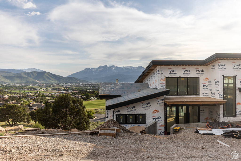 View of front of property with a mountain view