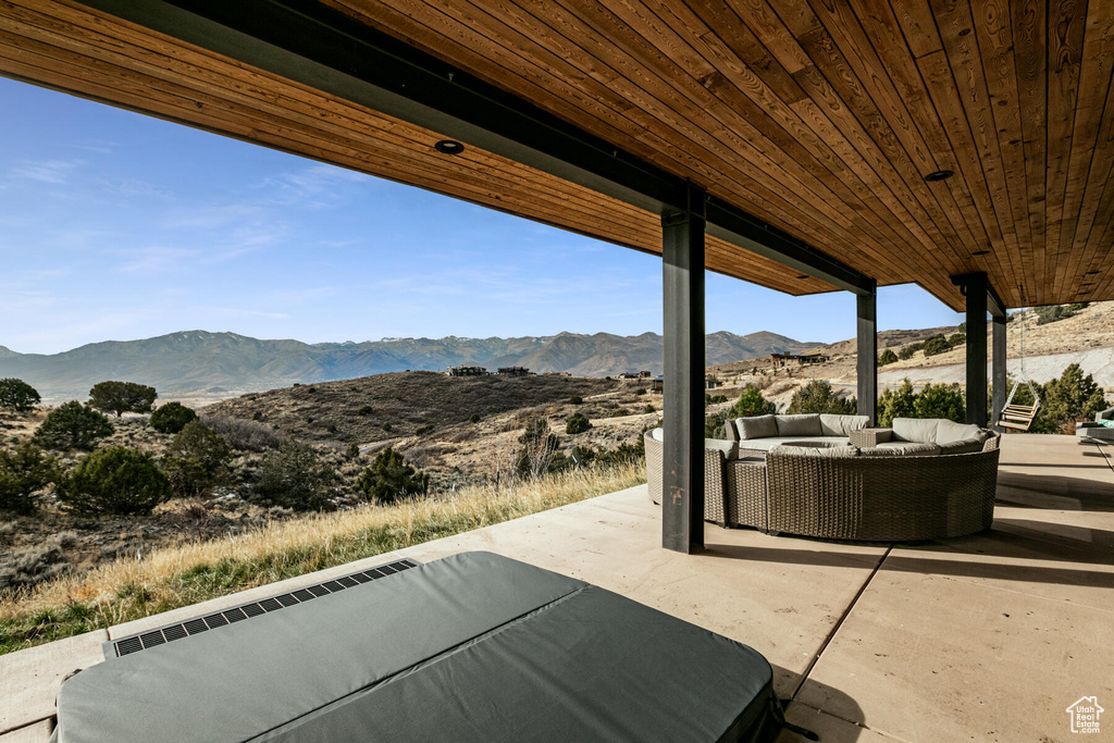 View of patio / terrace with outdoor lounge area and a mountain view