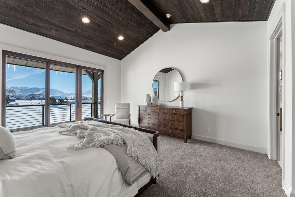 Carpeted bedroom featuring wooden ceiling, access to outside, a mountain view, high vaulted ceiling, and beamed ceiling