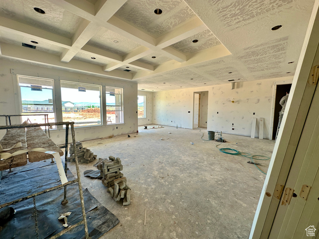 Miscellaneous room featuring beamed ceiling and coffered ceiling
