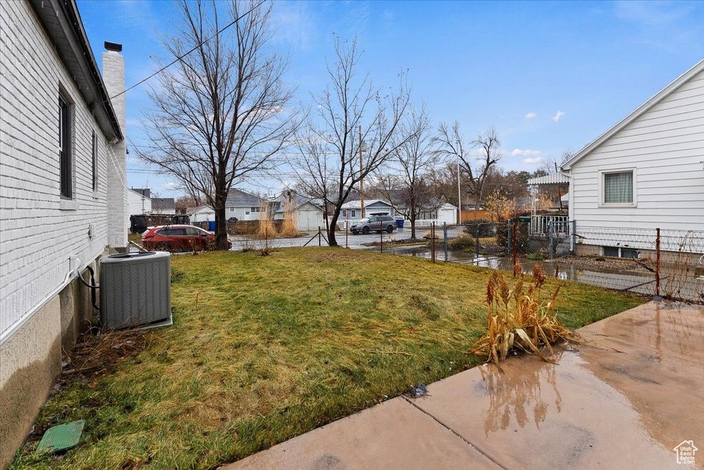 View of yard featuring central AC