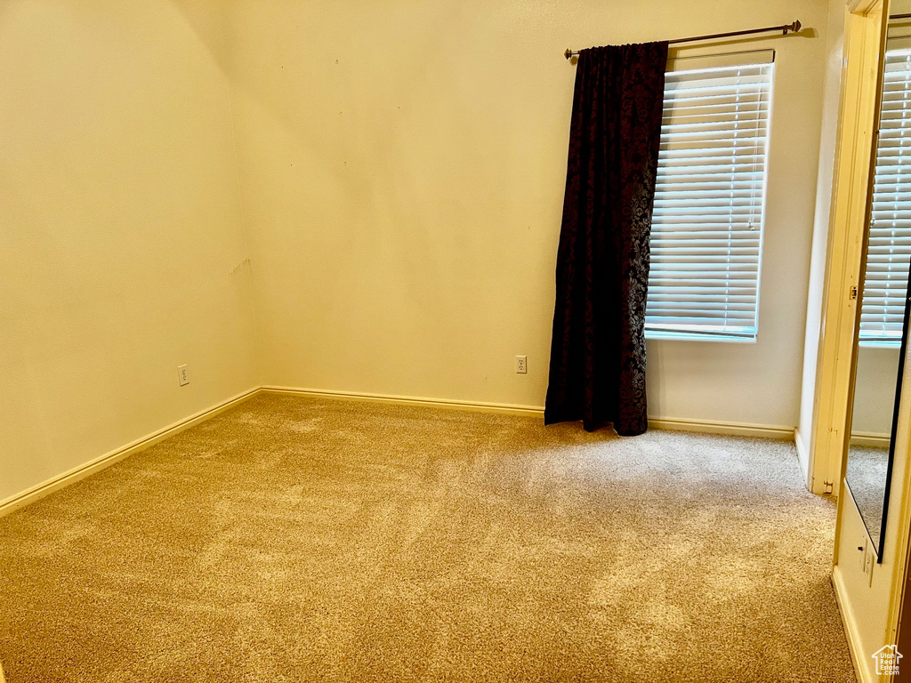 Spare room with light carpet