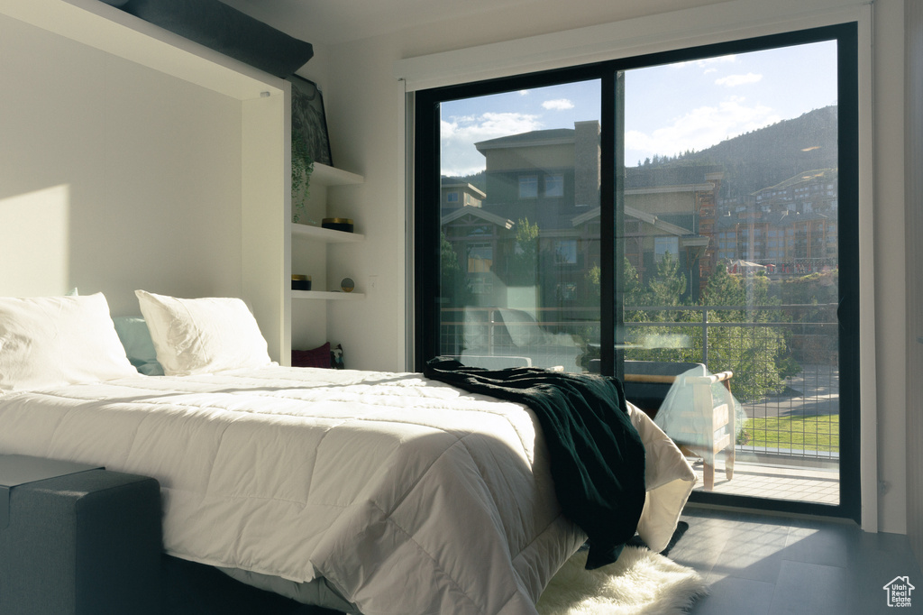 Bedroom featuring multiple windows