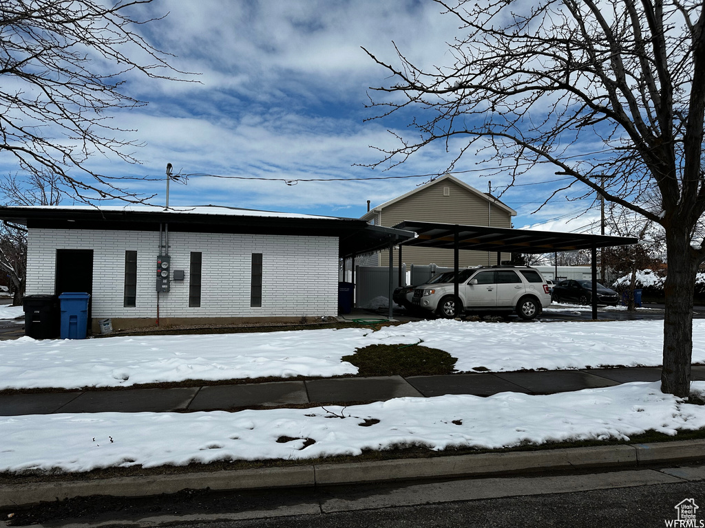 Exterior space with a carport