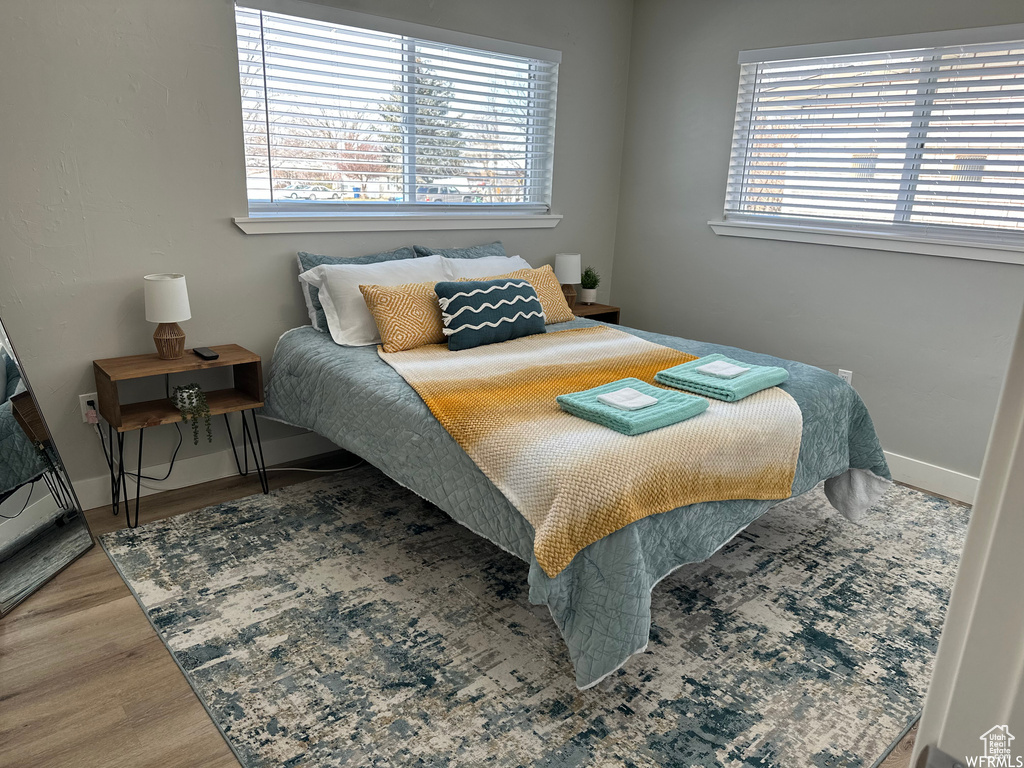 Bedroom featuring hardwood / wood-style flooring